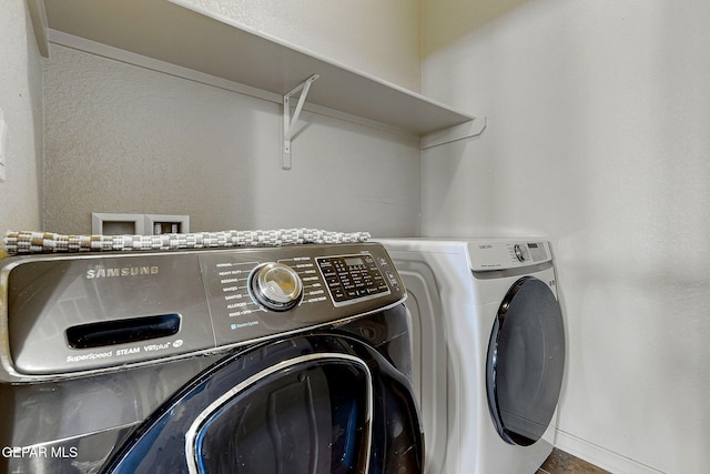 laundry room featuring laundry area and independent washer and dryer