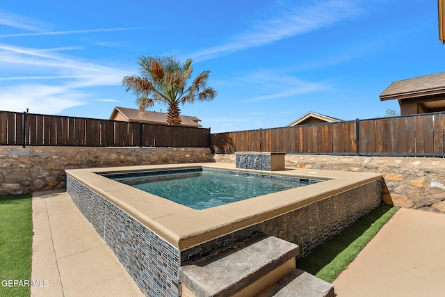view of swimming pool featuring a fenced backyard and a hot tub