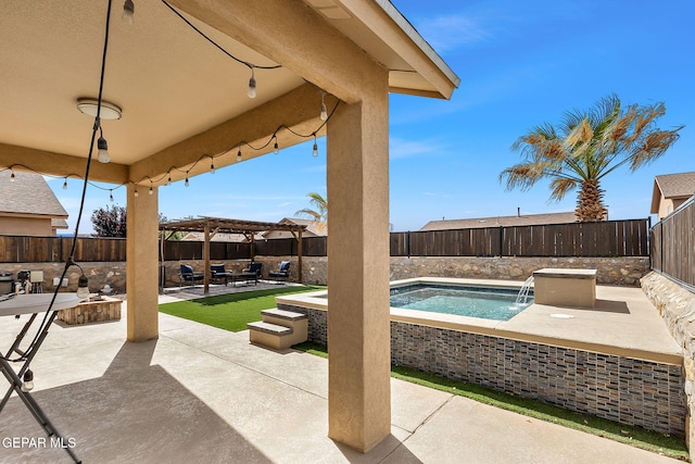 view of swimming pool with a patio area, a pergola, and a fenced backyard