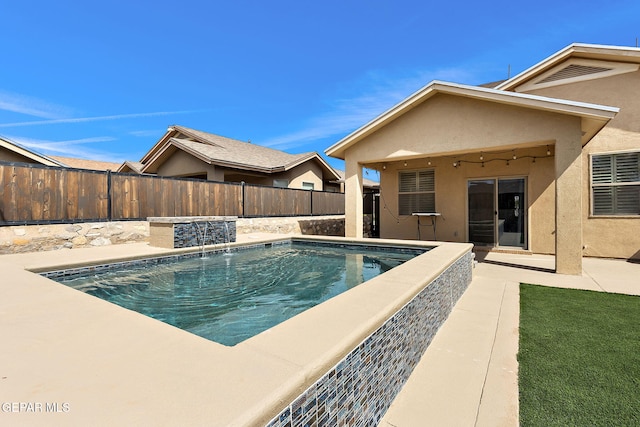view of pool with a fenced in pool, a fenced backyard, and a patio area