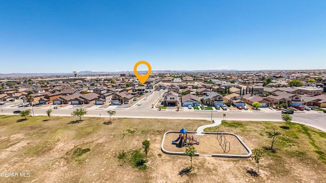 birds eye view of property with a residential view
