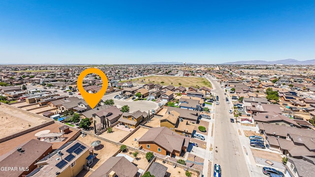 bird's eye view featuring a residential view and a mountain view
