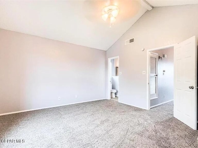 empty room with visible vents, a ceiling fan, beamed ceiling, high vaulted ceiling, and carpet flooring