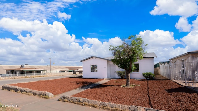 view of front of property with fence