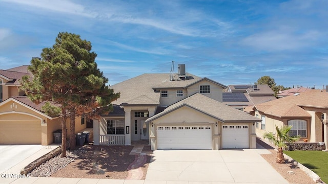 12617 Sun Spirit Dr, El Paso, TX 79938 - view of front of house featuring driveway, stucco siding, a garage, and roof with shingles