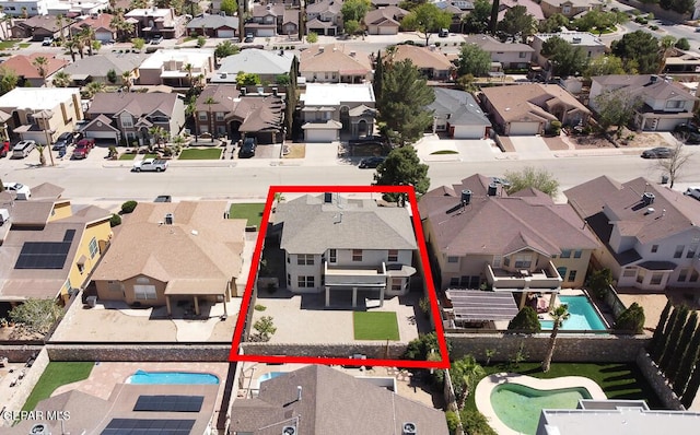 12617 Sun Spirit Dr, El Paso, TX 79938 - aerial perspective of suburban area featuring a pool and property parcel outlined