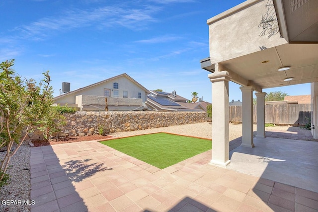 12617 Sun Spirit Dr, El Paso, TX 79938 - fenced backyard with a patio