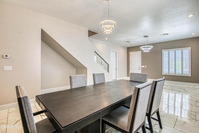 dining area with a chandelier, marble finish floor, recessed lighting, baseboards, and visible vents