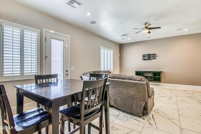 dining room featuring ceiling fan, recessed lighting, visible vents, and marble finish floor