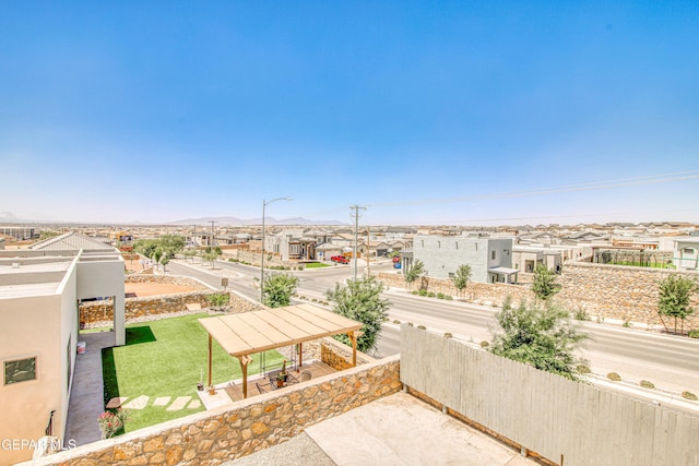exterior space with a mountain view and a residential view
