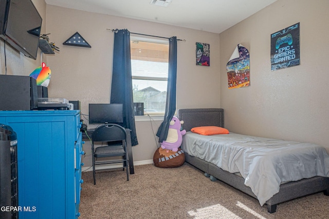 bedroom with carpet flooring and visible vents