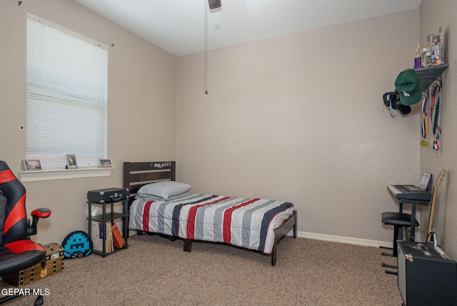 carpeted bedroom with baseboards