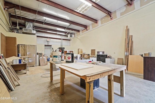 interior space featuring unfinished concrete floors