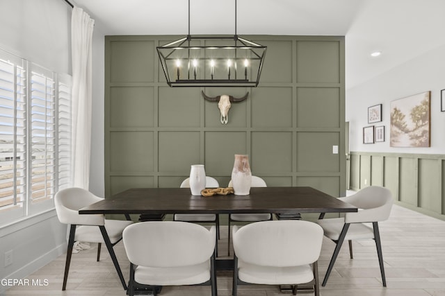 837 Durham Way, Horizon City, TX 79928 - dining area with a decorative wall, healthy amount of natural light, a chandelier, and baseboards