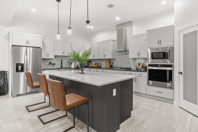 837 Durham Way, Horizon City, TX 79928 - kitchen featuring appliances with stainless steel finishes, wall chimney range hood, backsplash, a sink, and recessed lighting