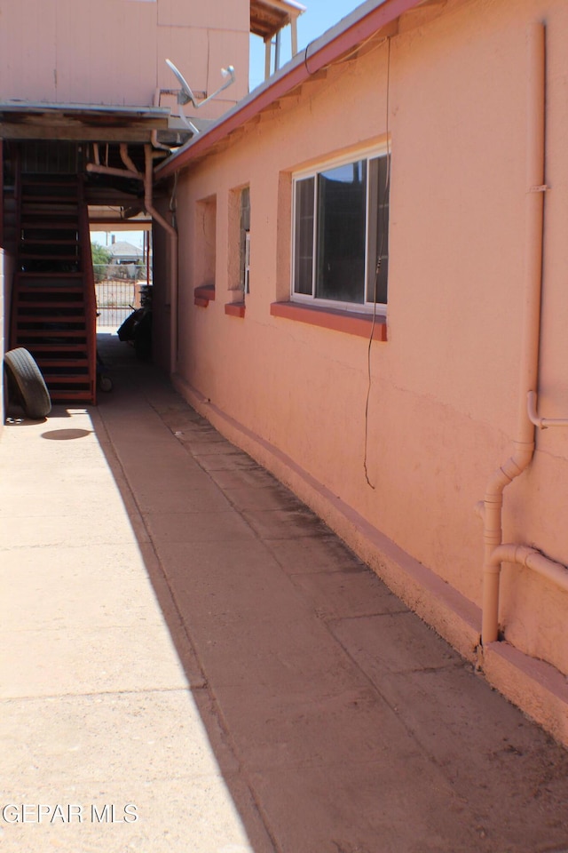 view of property exterior with stucco siding