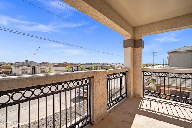 balcony featuring a residential view