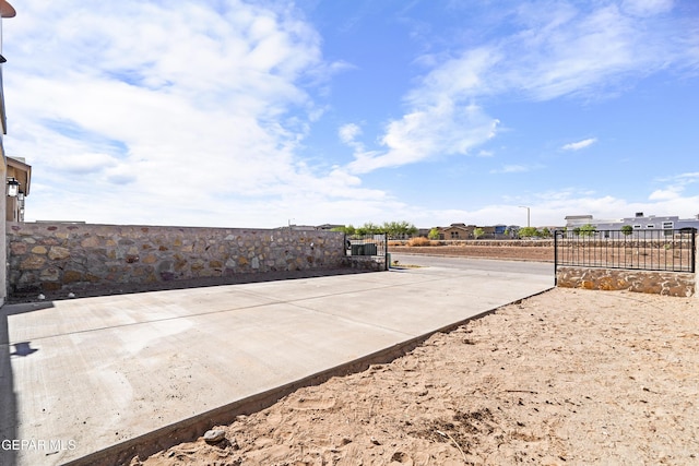 view of community featuring fence