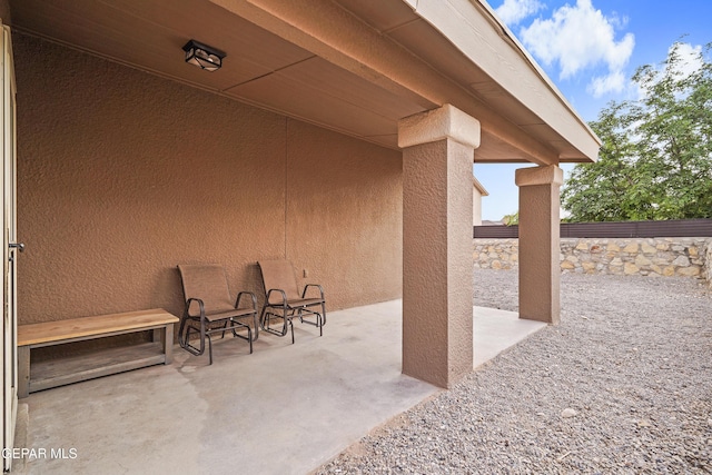 view of patio with fence