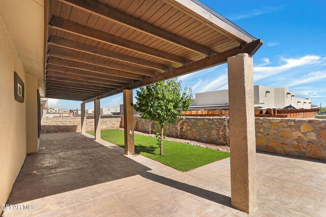 view of patio with a fenced backyard