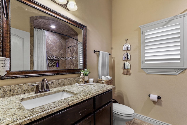 full bath featuring toilet, baseboards, curtained shower, tile patterned floors, and vanity