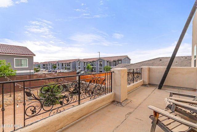 balcony featuring a residential view