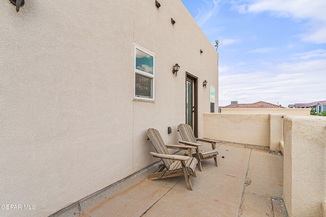 view of patio / terrace featuring a balcony
