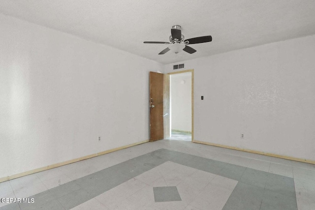 12365 Stubbs Dr, San Elizario, TX 79849 - empty room featuring a ceiling fan, baseboards, visible vents, and tile patterned flooring
