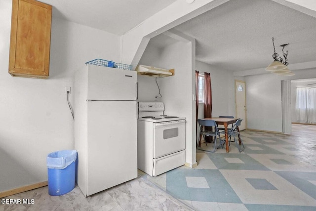 12365 Stubbs Dr, San Elizario, TX 79849 - kitchen featuring white appliances, a wealth of natural light, and light floors