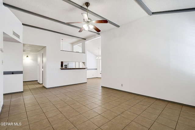 unfurnished living room with visible vents, baseboards, ceiling fan with notable chandelier, and tile patterned floors