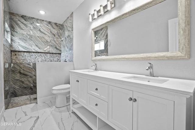 478 Sylvia Ct, Socorro, TX 79927 - full bath featuring a marble finish shower, marble look tiles, double vanity, and recessed lighting
