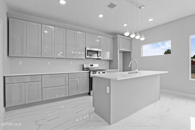 478 Sylvia Ct, Socorro, TX 79927 - kitchen with stainless steel appliances, gray cabinets, light marble finish flooring, recessed lighting, and pendant lighting