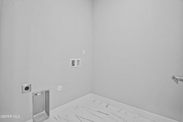 478 Sylvia Ct, Socorro, TX 79927 - washroom with hookup for a washing machine, marble finish flooring, hookup for an electric dryer, and hookup for a gas dryer