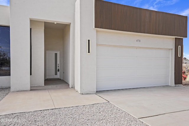478 Sylvia Ct, Socorro, TX 79927 - garage featuring concrete driveway