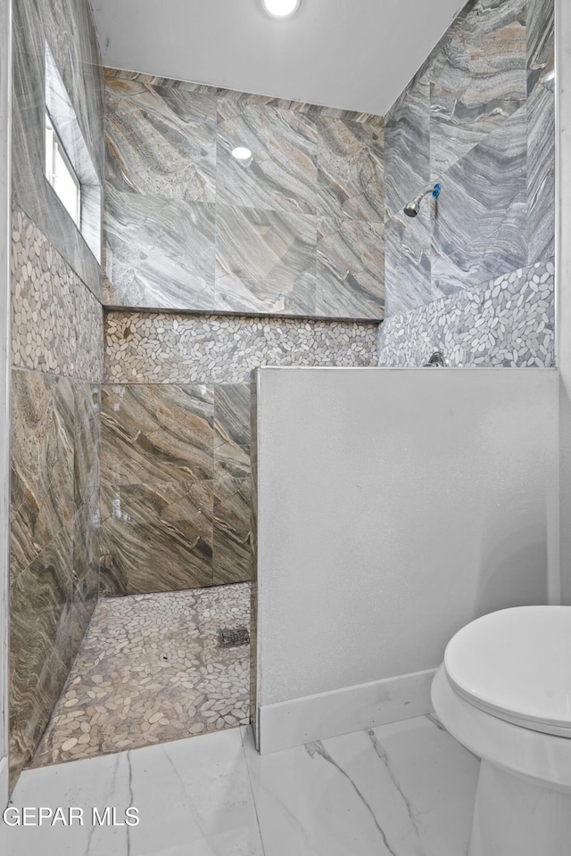 478 Sylvia Ct, Socorro, TX 79927 - full bathroom with marble look tiles and a tile shower