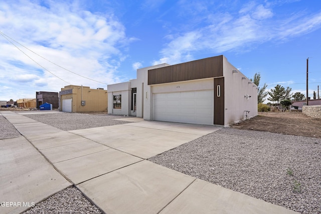 478 Sylvia Ct, Socorro, TX 79927 - view of front of home featuring driveway and an attached garage