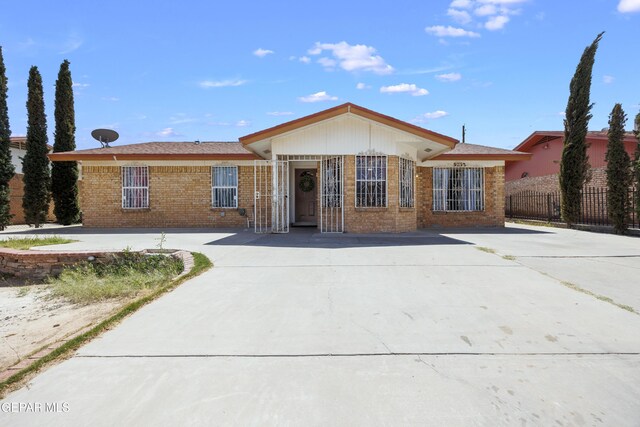 9232 Morelia Rd, El Paso, TX 79907 - ranch-style house with brick siding and fence