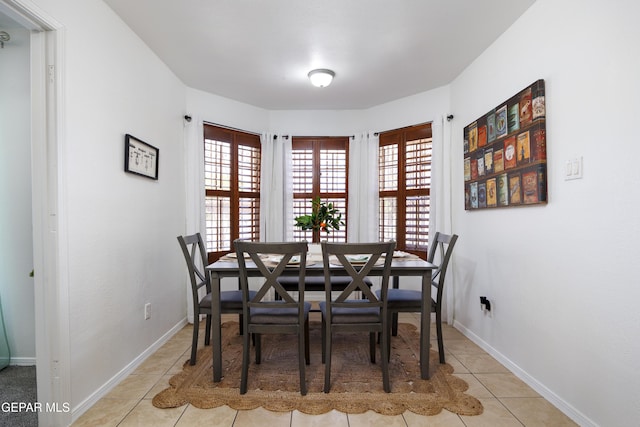 9232 Morelia Rd, El Paso, TX 79907 - dining space featuring light tile patterned floors and baseboards