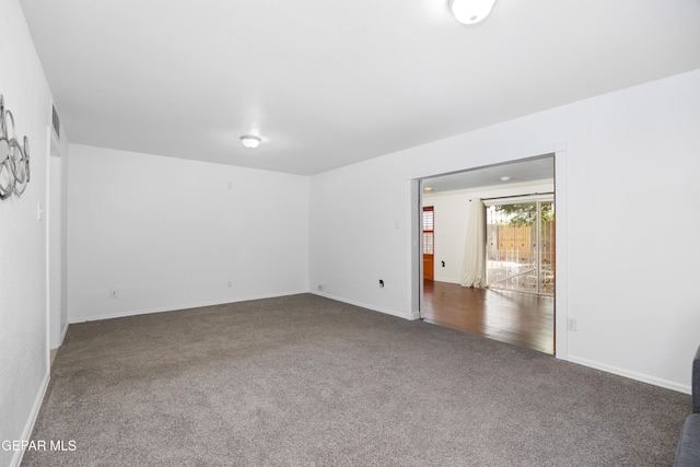 9232 Morelia Rd, El Paso, TX 79907 - carpeted empty room with baseboards and visible vents