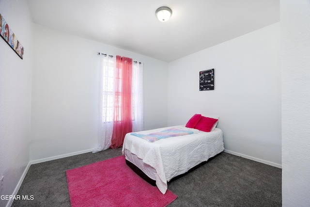 9232 Morelia Rd, El Paso, TX 79907 - bedroom featuring baseboards and carpet flooring