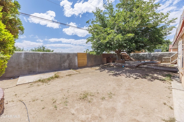 9232 Morelia Rd, El Paso, TX 79907 - view of yard with a gate and fence
