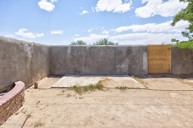 9232 Morelia Rd, El Paso, TX 79907 - view of yard featuring a gate and fence