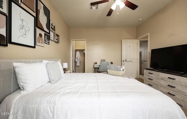 bedroom with a ceiling fan and visible vents