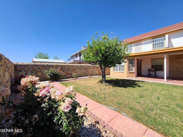 10812 Sandy Koufax Dr, El Paso, TX 79924 - view of yard featuring fence and a patio area