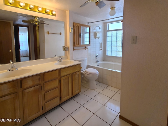 10812 Sandy Koufax Dr, El Paso, TX 79924 - bathroom featuring a sink, a ceiling fan, and tiled shower / bath combo