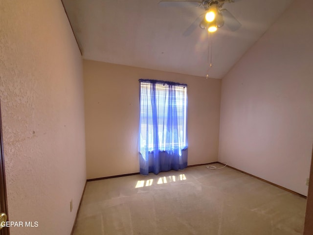 10812 Sandy Koufax Dr, El Paso, TX 79924 - empty room featuring baseboards, a ceiling fan, lofted ceiling, and carpet flooring