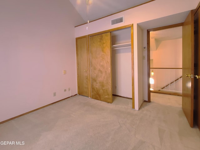 10812 Sandy Koufax Dr, El Paso, TX 79924 - unfurnished bedroom with visible vents, carpet, lofted ceiling, and a closet