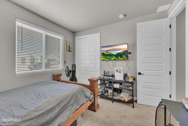 bedroom with light carpet