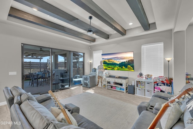 living area with recessed lighting, beamed ceiling, and wood finished floors