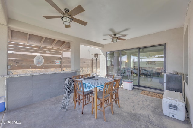 exterior space featuring a ceiling fan and outdoor dining space